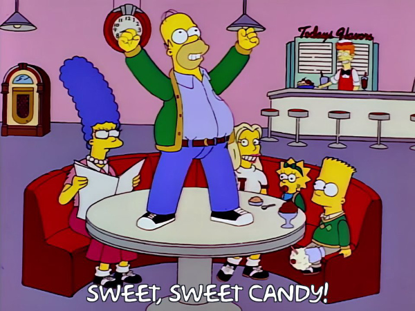 Homer Simpson dances and yells 'Candy, sweet candy.'