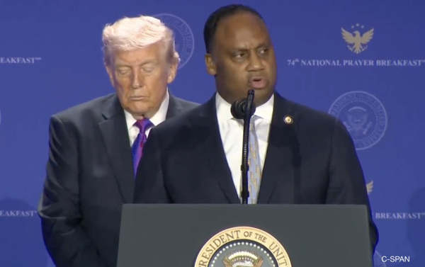 Jackson is speaking, Trump
is behind him with eyes closed