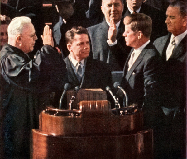 Left to right: Earl Warren,
James R. Browning and John F. Kennedy, as Kennedy recites the oath of office.