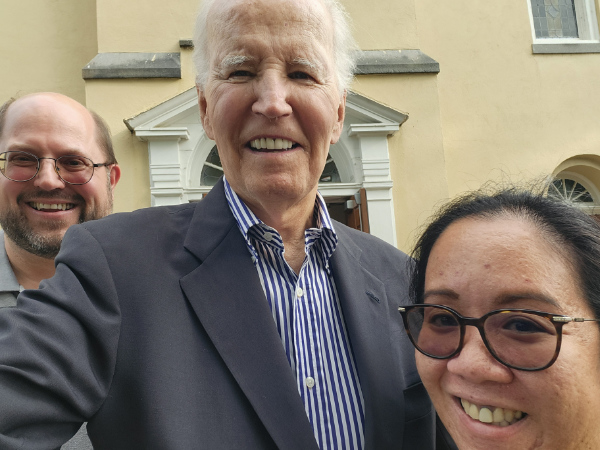 Reader P.M., a smiling
Joe Biden, and P.M.'s wife